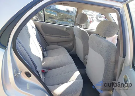 1999 Toyota Corolla Ce z USA, uszkodzony, nr VIN 2T1BR12E1XC256967